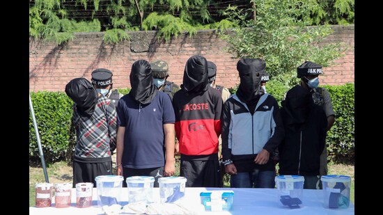 Jammu and Kashmir Police personnel arrested five hybrid terrorists allegedly involved in the killing of Udhampur circus worker Deepak Kumar in Anantnag, in Srinagar on Friday. (ANI)