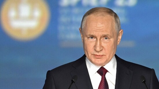Russian President Vladimir Putin addresses a plenary session of the St. Petersburg International Economic Forum in St. Petersburg, Russia, Friday. (AP)