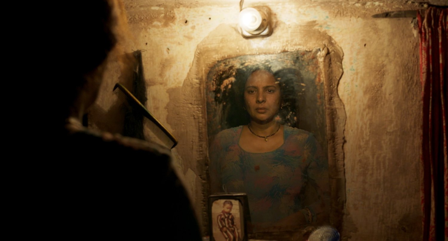 Sonal Jha brings a brooding intensity to her Kamla, Chandra’s (Vinamrata Rai) widowed sister-in-law in Fire in the Mountains (2021) Sonal Jha brings a brooding intensity to her Kamla, Chandra’s (Vinamrata Rai) widowed sister-in-law in Fire in the Mountains (2021)