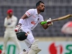 Najmul Hossain Shanto celebrates after scoring a century (100 runs) during the third day of the Test cricket match between Bangladesh and Afghanistan Najmul Hossain Shanto celebrates after scoring a century (100 runs) during the third day of the Test cricket match between Bangladesh and Afghanistan