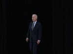US president Joe Biden walks to attend a briefing. US president Joe Biden walks to attend a briefing.