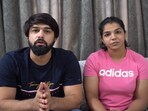Olympic medalist Sakshee Malikkh, and wrestler and her husband Satyawart Kadian.