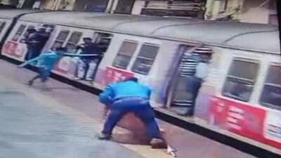 Vashi GRP cop saves life of old woman who fell off moving train Vashi GRP cop saves life of old woman who fell off moving train