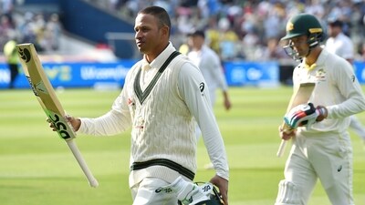 Usman Khawaja leaves the pitch at the end of play during Day 2 of the first Ashes Test (AP) Usman Khawaja leaves the pitch at the end of play during Day 2 of the first Ashes Test (AP)