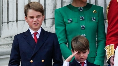 Prince George, left, and Prince Louis, greet the crowd from the balcony of Buckingham Palace. (AP) Prince George, left, and Prince Louis, greet the crowd from the balcony of Buckingham Palace. (AP)