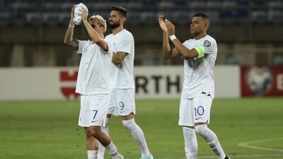 (From L) France's forward Griezmann, Olivier Giroud and Kylian Mbappe celebrate at the end of the UEFA Euro 2024 group B qualification football match (AFP) (From L) France's forward Griezmann, Olivier Giroud and Kylian Mbappe celebrate at the end of the UEFA Euro 2024 group B qualification football match (AFP)