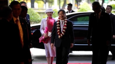 Japan's Emperor Naruhito (C) and Empress Masako in Jakarta. (AFP)