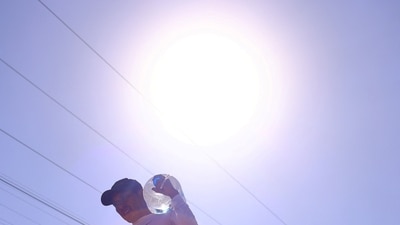 The scorching summer has sparked power outages across the state, leaving people with no running water, fans, or air conditioners. (REUTERS)