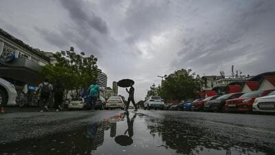 New Delhi, India - June 17, 2023: Commuters out in the rain at connaught place area in New Delhi, India, on Saturday, June 17, 2023. (Photo by Raj K Raj/ Hindustan Times) (Raj K Raj/HT PHOTO)