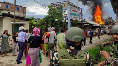 Unidentified miscreants torch two houses belonging to a particular community to retaliate the killing of nine civilians by Kuki militants, in Manipur. (PTI)
