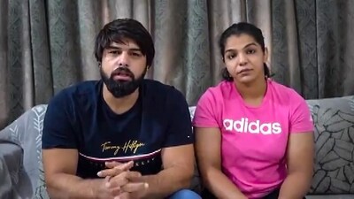 Wrestlers Satyawart Kadian and Sakshi Malik speaks during a video message on Saturday (PTI) Wrestlers Satyawart Kadian and Sakshi Malik speaks during a video message on Saturday (PTI)