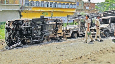 South 24 Parganas, June 16 (ANI): Police personnel stand guard at the incident site where violent clashes erupted during the filing of nominations for the upcoming West Bengal Panchayat elections, at Bhangar in South 24 Parganas on Friday. (ANI Photo) (Shyamal Maitra) South 24 Parganas, June 16 (ANI): Police personnel stand guard at the incident site where violent clashes erupted during the filing of nominations for the upcoming West Bengal Panchayat elections, at Bhangar in South 24 Parganas on Friday. (ANI Photo) (Shyamal Maitra)