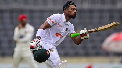 Najmul Hossain Shanto celebrates after scoring a century (100 runs) during the third day of the Test cricket match between Bangladesh and Afghanistan (AFP) Najmul Hossain Shanto celebrates after scoring a century (100 runs) during the third day of the Test cricket match between Bangladesh and Afghanistan (AFP)
