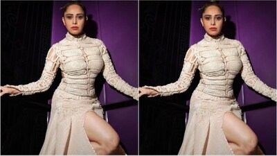 Nushratt's makeup look was a stunning combination of nude eyeshadow, winged eyeliner, mascara-coated lashes, contoured cheeks with a touch of blush, and a bold matte red lipstick. (Instagram/@nushrrattbharuccha) Nushratt's makeup look was a stunning combination of nude eyeshadow, winged eyeliner, mascara-coated lashes, contoured cheeks with a touch of blush, and a bold matte red lipstick. (Instagram/@nushrrattbharuccha)