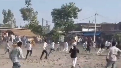 Screengrab of the video shows people pelting stones, creating ruckus at the event organised in Uttar Pradesh's Gonda district.