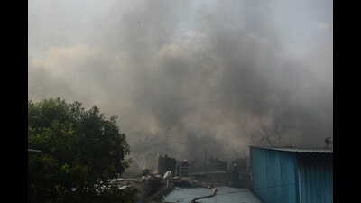 A massive fire broke out near Gangadham Road in Kondhwa-Bibwewadi area on Sunday, destroying nearly 20-25 godowns. (Shankar Narayan/HT PHOTO) A massive fire broke out near Gangadham Road in Kondhwa-Bibwewadi area on Sunday, destroying nearly 20-25 godowns. (Shankar Narayan/HT PHOTO)