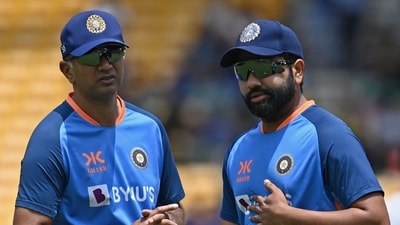 India's captain Rohit Sharma (R) speaks with his team coach Rahul Dravid (AFP) India's captain Rohit Sharma (R) speaks with his team coach Rahul Dravid (AFP)