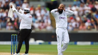 England's Moeen Ali reacts after Australia's Pat Cummins hits a six off his bowling (Reuters)