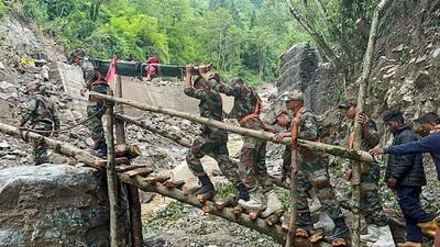 Indian Army personnel during a rescue operation in North Sikkim on Sunday. (PTI)