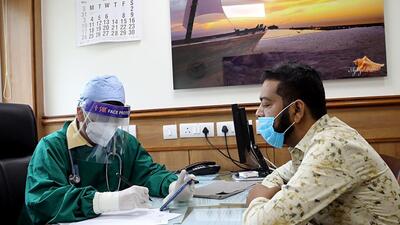 New Delhi, May 11 (ANI): A Doctor wears protective shield as he checks the patients at the OPD of Ganga Ram hospital during the nationwide lockdown in New Delhi on Monday. (ANI Photo) (ANI)