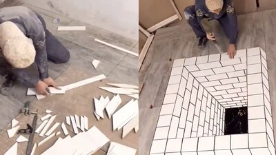 Man makes optical illusion using tiles. (Twitter/@Rainmaker1973) Man makes optical illusion using tiles. (Twitter/@Rainmaker1973)
