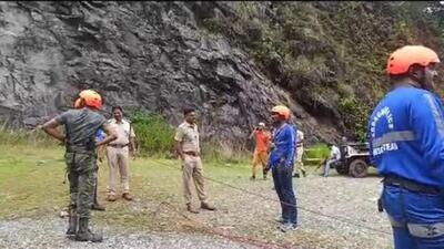 Police personnel are being trained in a 120ft deep quarry. Police personnel are being trained in a 120ft deep quarry.