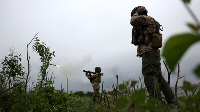 Ukrainian soldiers of the 28th Separate Mechanized Brigade fire a grenade launcher at the front line near the town of Bakhmut. (AFP) Ukrainian soldiers of the 28th Separate Mechanized Brigade fire a grenade launcher at the front line near the town of Bakhmut. (AFP)