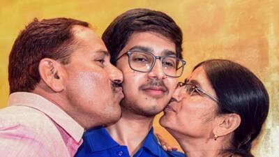 Vavilala Chidvilas Reddy with his parents. (PTI) Vavilala Chidvilas Reddy with his parents. (PTI)