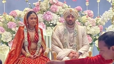 Drisha Acharya and Karan Deol as bride and groom.