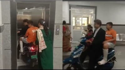 Man enters hospital on a scooter. Man enters hospital on a scooter.