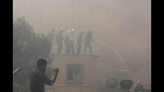 The residents of Bhavani Peth, Kondhwa, and Bibwewadi find themselves living under constant risk as godowns in the vicinity have become prone to frequent fire incidents. (Shankar Narayan/HT PHOTO)