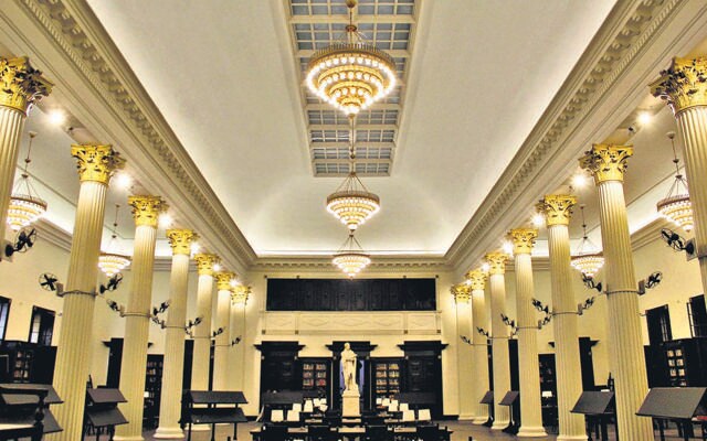 Built in 1833 in the heart of the fortified Bombay, this building in Mumbai once served as a Town Hall, court, and university hall, and today houses the Asiatic Society and State Central Library. (HT Archive) Built in 1833 in the heart of the fortified Bombay, this building in Mumbai once served as a Town Hall, court, and university hall, and today houses the Asiatic Society and State Central Library. (HT Archive)
