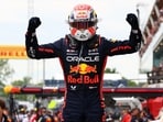 Red Bull's Max Verstappen celebrates after winning the race