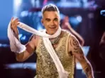 Robbie Williams, the renowned singer and former Take That member, had an unexpected setback during his recent concert at the Pinkpop music festival in the Netherlands.