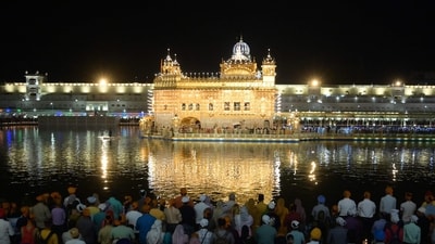 Sikh devotees gather to pay respect on the occasion of the birth anniversary of Guru Hargobind Singh at the Golden Temple in Amritsar on June 5, 2023. (Photo by Narinder NANU / AFP) (AFP) Sikh devotees gather to pay respect on the occasion of the birth anniversary of Guru Hargobind Singh at the Golden Temple in Amritsar on June 5, 2023. (Photo by Narinder NANU / AFP) (AFP)