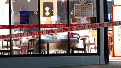 Police tape cordons off a restaurant in Auckland, New Zealand, Tuesday, June 20, 2023, after an axe attack late Monday. (AP)