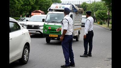 Noida, India- June 19, 2023: Traffic is seen moving slowly in Noida, India, on Monday, June 19, 2023. The Gautam Buddh Nagar police on Monday banned the entry of heavy and medium goods vehicles, autos, e-rickshaw passenger vehicles, tractors, bullock carts, and pulling rickshaws in the major routes of Noida and Greater Noida during the peak hours for smooth traffic movement and reduce the road accidents (Photo by Sunil Ghosh / Hindustan Times)**To go with Arun’s story (Sunil Ghosh/HT Photo)