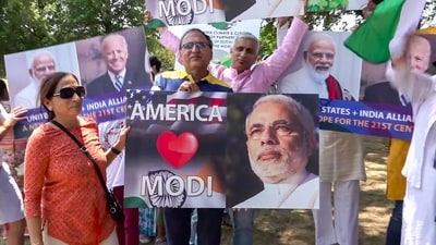 Indian community members hold posters of Prime Minister Narendra Modi during Unity rally, ahead of his visit to the US, in Washington. (PTI) Indian community members hold posters of Prime Minister Narendra Modi during Unity rally, ahead of his visit to the US, in Washington. (PTI)