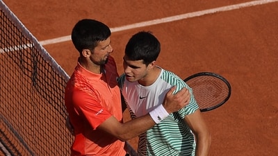 Serbia's Novak Djokovic (L) comforts Spain's Carlos Alcaraz Garfia after his victory (AFP) Serbia's Novak Djokovic (L) comforts Spain's Carlos Alcaraz Garfia after his victory (AFP)