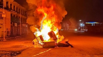 Tyres and construction materials set on fire by miscreants amid ongoing ethnic violence in Manipur, in Imphal East district, Friday. (PTI) Tyres and construction materials set on fire by miscreants amid ongoing ethnic violence in Manipur, in Imphal East district, Friday. (PTI)