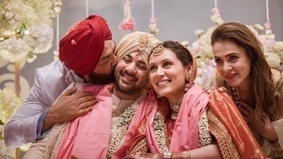 Karan's uncle Bobby Deol also welcomed Drisha Acharya into the family. Sharing two candid pictures from the wedding, he wrote on Instagram, “Blessed to have a daughter in our family now … god bless you both.” Karan's uncle Bobby Deol also welcomed Drisha Acharya into the family. Sharing two candid pictures from the wedding, he wrote on Instagram, “Blessed to have a daughter in our family now … god bless you both.”