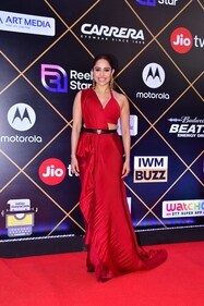 Nushrratt Bharuccha embraced a stunning red saree look for the awards night. (HT phtoto/VarinderChawla)