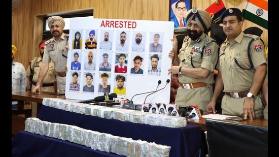 Commissioner of police Mandeep Singh Sidhu giving details of the arrests in Ludhiana on Monday. (Gurpreet Singh/HT)