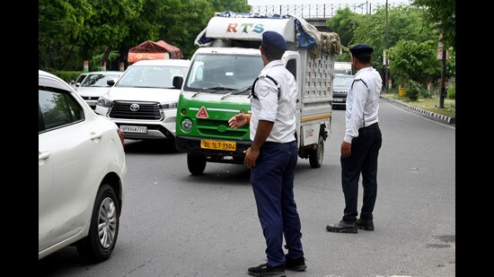 Noida, India- June 19, 2023: Traffic is seen moving slowly in Noida, India, on Monday, June 19, 2023. The Gautam Buddh Nagar police on Monday banned the entry of heavy and medium goods vehicles, autos, e-rickshaw passenger vehicles, tractors, bullock carts, and pulling rickshaws in the major routes of Noida and Greater Noida during the peak hours for smooth traffic movement and reduce the road accidents (Photo by Sunil Ghosh / Hindustan Times)**To go with Arun’s story (Sunil Ghosh/HT Photo)