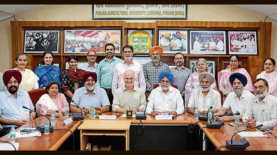 PAU and ACIAR officials at the varsity in Ludhiana on Monday. (HT Photo)