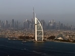 A view of the Burj Al Arab hotel and Burj Khalifa in Dubai, United Arab Emirates.