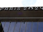 The logo of the Paris 2024 Olympics and Paralympics Games is seen on the Pulse building, the headquarters of the Paris 2024 Olympics organizing committee, as a police search is currently underway