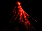 Lava flows down the slopes of Mayon volcano as seen from Legazpi, Albay province, northeastern Philippines. Thousands of poor Filipinos risk their lives by living and working in villages inside a permanent danger zone around Mayon volcano. 