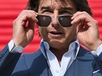 Tom Cruise puts on his sunglasses as he poses ahead of the premiere of Mission Impossible Dead Reckoning Part One in Rome. (AFP)