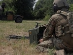 A Ukrainian serviceman prepares a remote controller for an AN/TWQ-1 Avenger mobile air defence missile system during his combat shift, amid Russia's attack on Ukraine, outside of Kyiv, Ukraine.